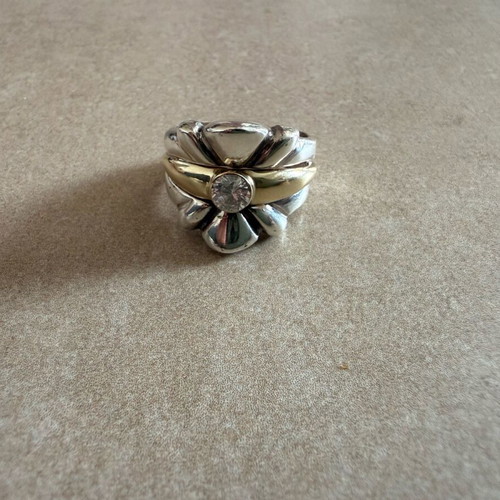Silver and gold ring with diamond used