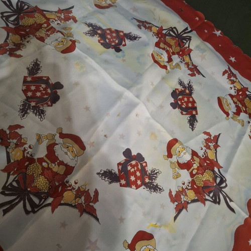 Christmas tablecloth used with yellow stains