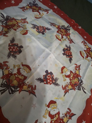 Christmas tablecloth used with yellow stains