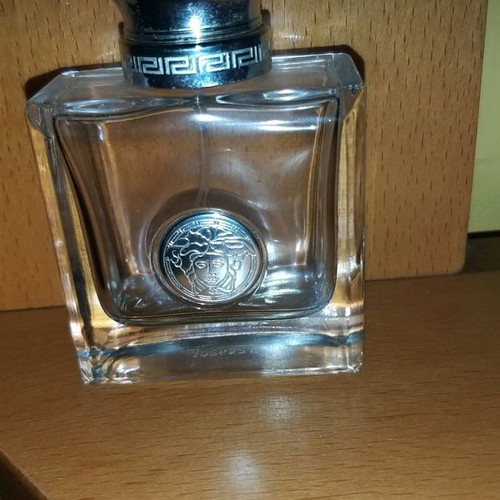 Empty Versense perfume bottle by Versace