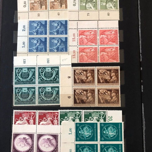 Stamp album with large collection of mint and used blocks worldwide