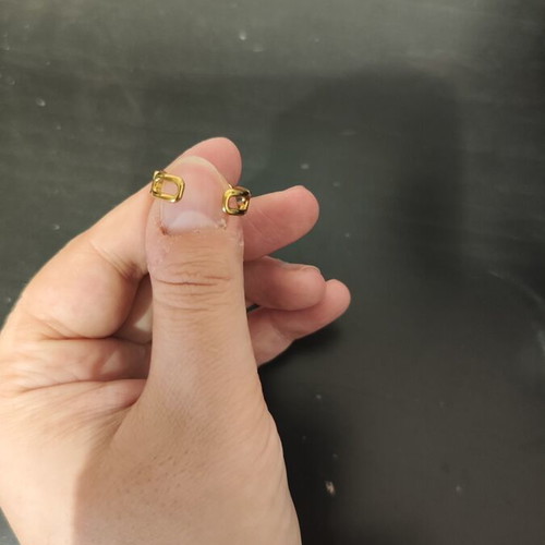 Adjustable stainless steel ring gold tone like new
