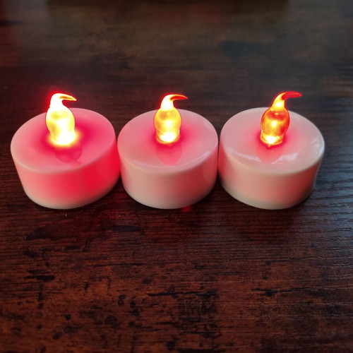 Battery-operated tealight candles, set of three, like new