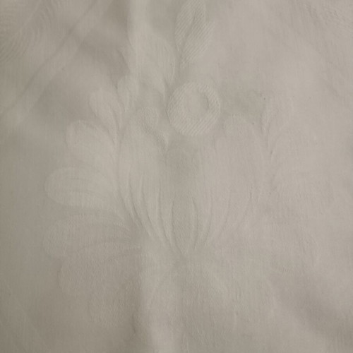 White tablecloth set with 12 used embossed napkins