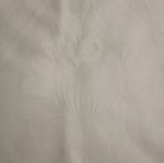 White tablecloth set with 12 used embossed napkins