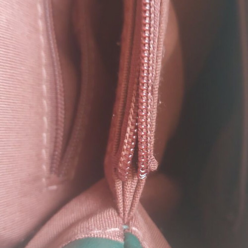 David Jones green backpack used with internal pocket repair needed