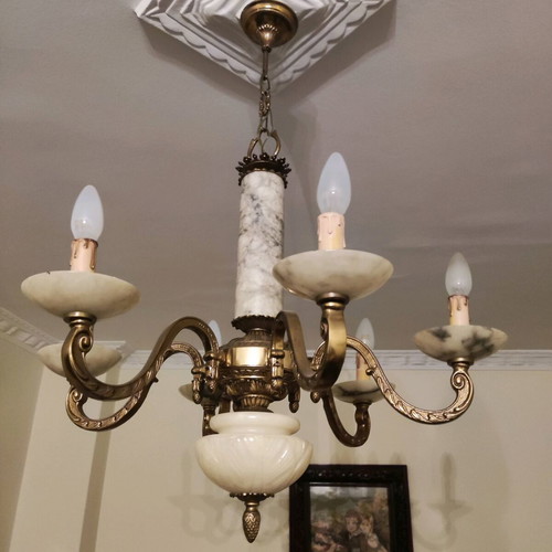 Vintage chandelier used, made of bronze and natural stone