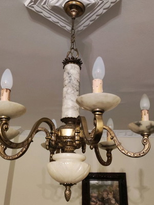 Vintage chandelier used, made of bronze and natural stone