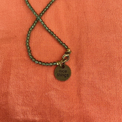 Nice Things necklace used with wooden and plastic beads