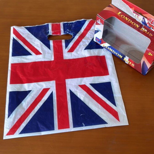 Plastic bag with English flag and small empty London bus box like new