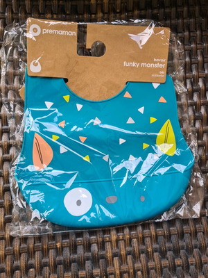 Silicone bib with little monster design blue new