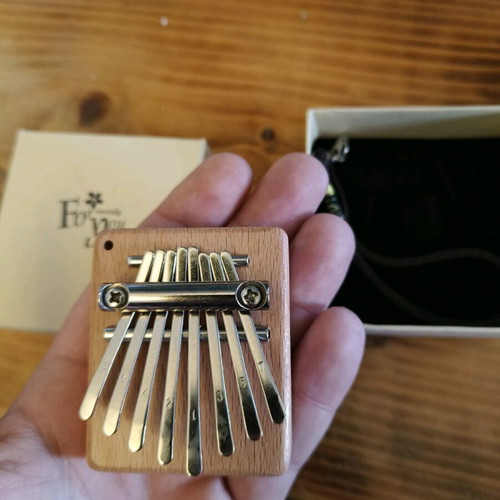Mini kalimba new, closed in its box