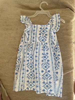 Girls' sleeveless blouse with bow on back like new, age 6