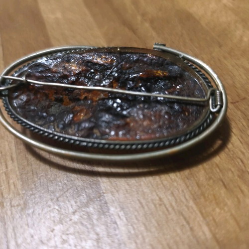 Amber brooch like new, weight 26 grams, length 6.5cm