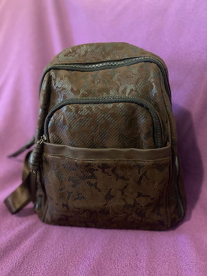 Velvet backpack like new, brown with multiple compartments
