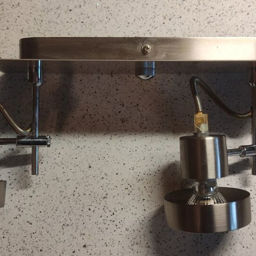 Ceiling light used with adjustable spotlights
