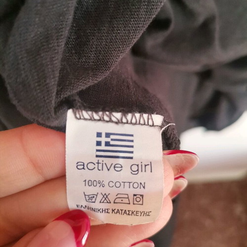 Black blouse one size like new with cord and unique design