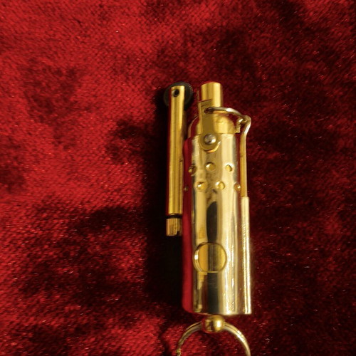 Vintage gold lighter stick-style, like new
