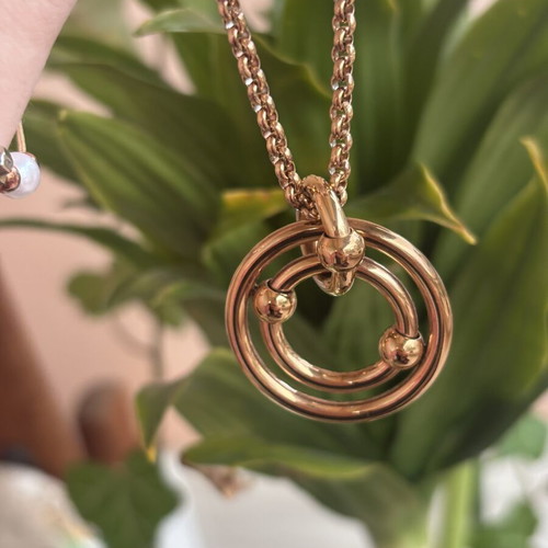 Folli Follie necklace with concentric circles like new, rose gold plated stainless steel