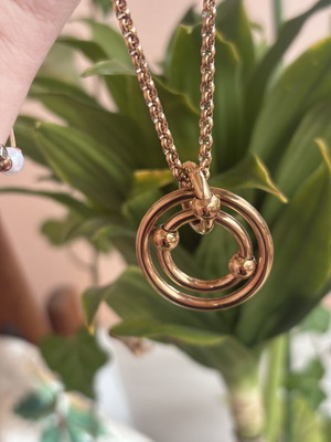 Folli Follie necklace with concentric circles like new, rose gold plated stainless steel