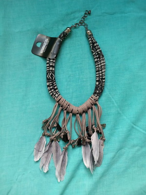Boho necklace new with black and white braided cord and feather details