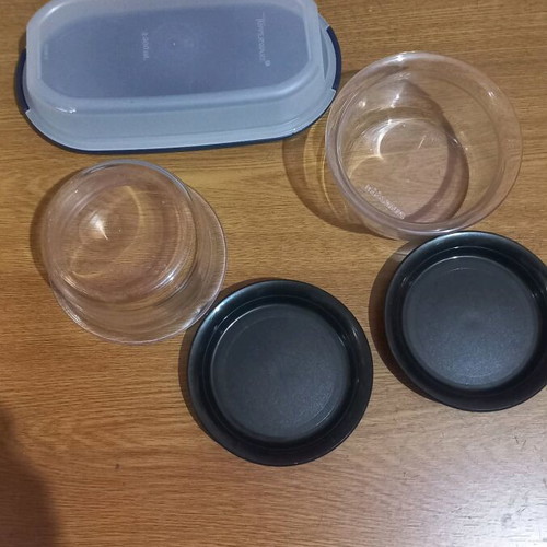 Tupperware new, set of 4 pieces for honey, butter or jam