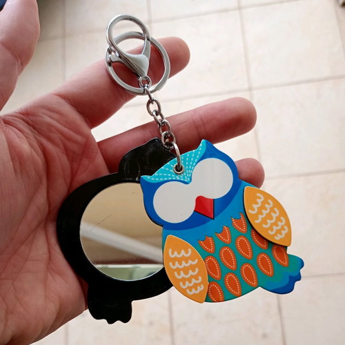 Owl keychain with mirror used