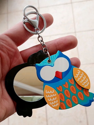 Owl keychain with mirror used