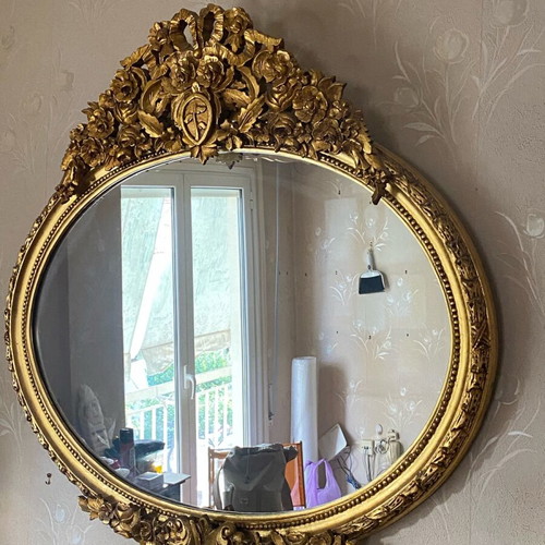 Vintage oval wooden carved mirror used in gold color