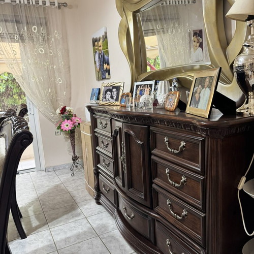 Dining table with 6 chairs and wooden dresser with mirror like new