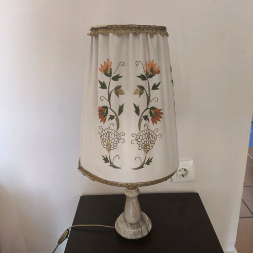 Vintage table lamp with embroidered fabric shade used