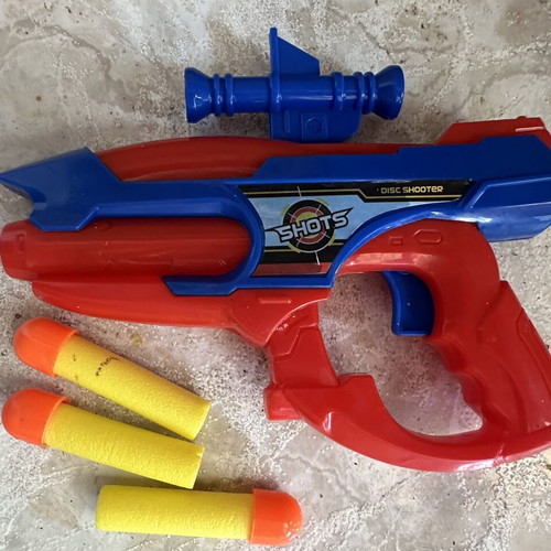 Toy gun with foam darts