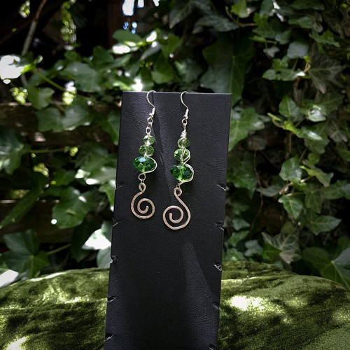 Earrings with green crystals and spiral charms new, silver