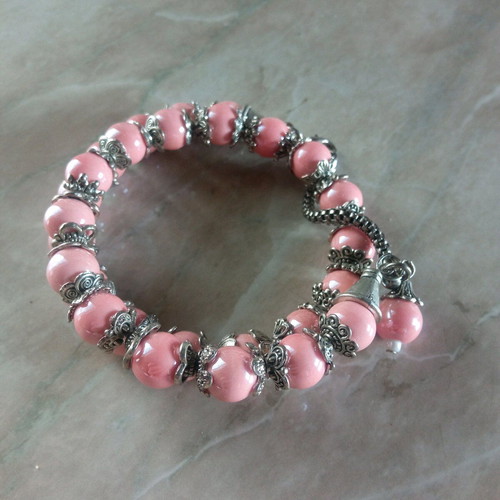 Handmade pink bracelet with beads and silver tones new