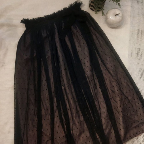 Skirt used with tulle on satin salmon base and black polka dots