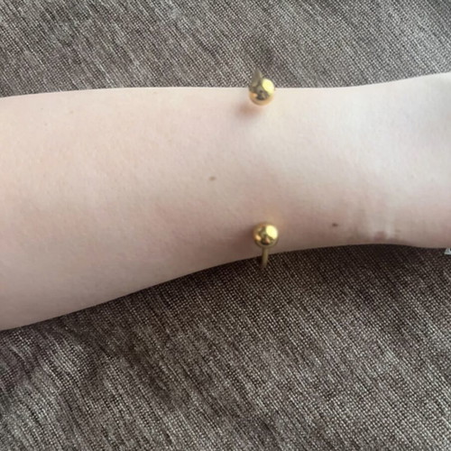 Handcuff bracelet like new, gold color