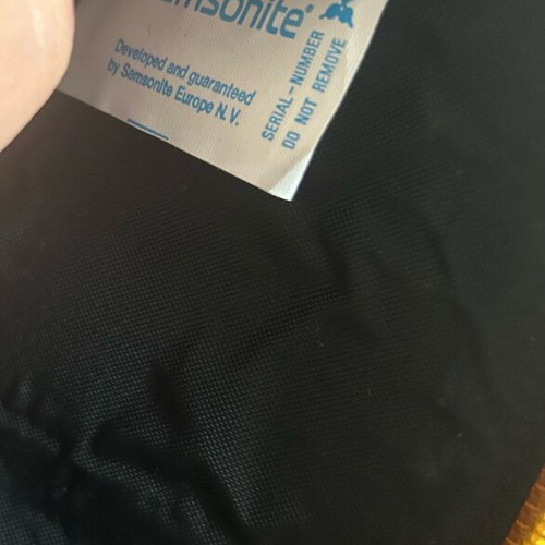 Samsonite wallet used, yellow with zipper closure
