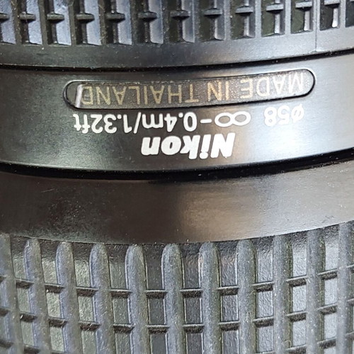Nikon F70 used with 28-80 lens and case