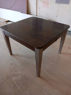 Wooden table with extension used with wear