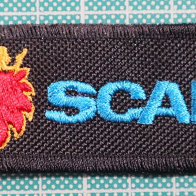 Fabric keychain Truck with embroidered logo 12x3 cm new, black