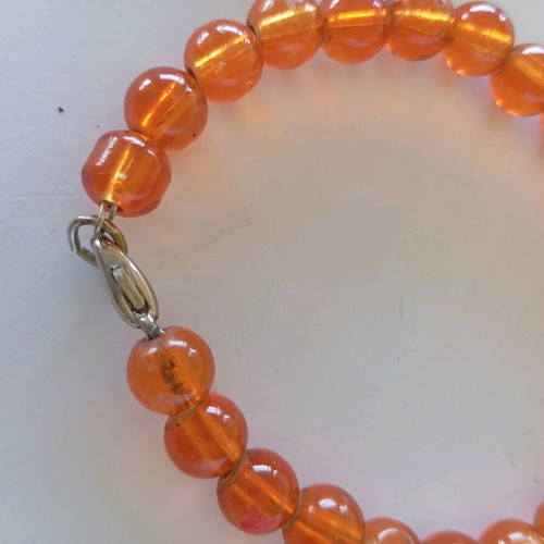 Orange bracelets set of 2 with boy and girl charms