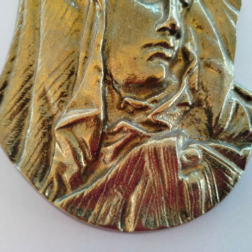 Bronze sculpture used with minor dents