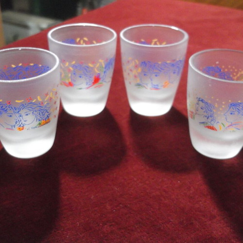 Collectible shot glasses set of 4 designed by G. Stathopoulos like new