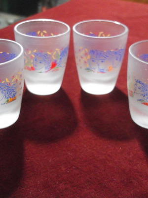 Collectible shot glasses set of 4 designed by G. Stathopoulos like new