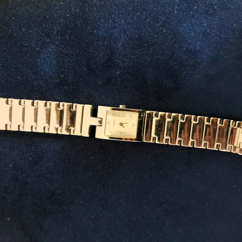 Timex women's quartz watch with used silver metal bracelet