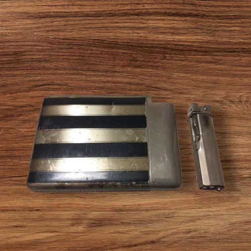 Vintage cigarette case with lighter used
