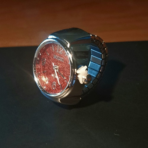 Ring watch quartz with red burgundy glitter dial and silver bracelet like new