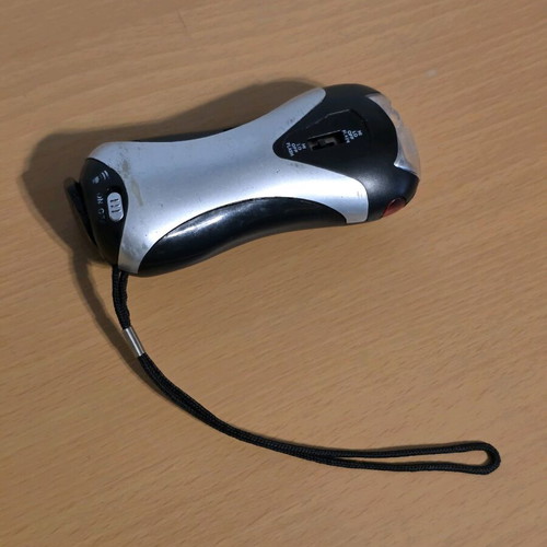 Flashlight with crank used with alarm