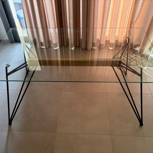 Modern glass dining table with black metal legs, like new