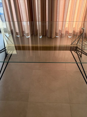 Modern glass dining table with black metal legs, like new